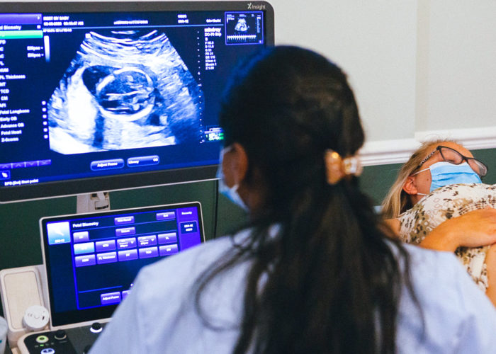  sonographer scanning pregnant women